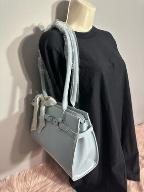 Chic Pale Blue Shoulder Bag with Bow Accent